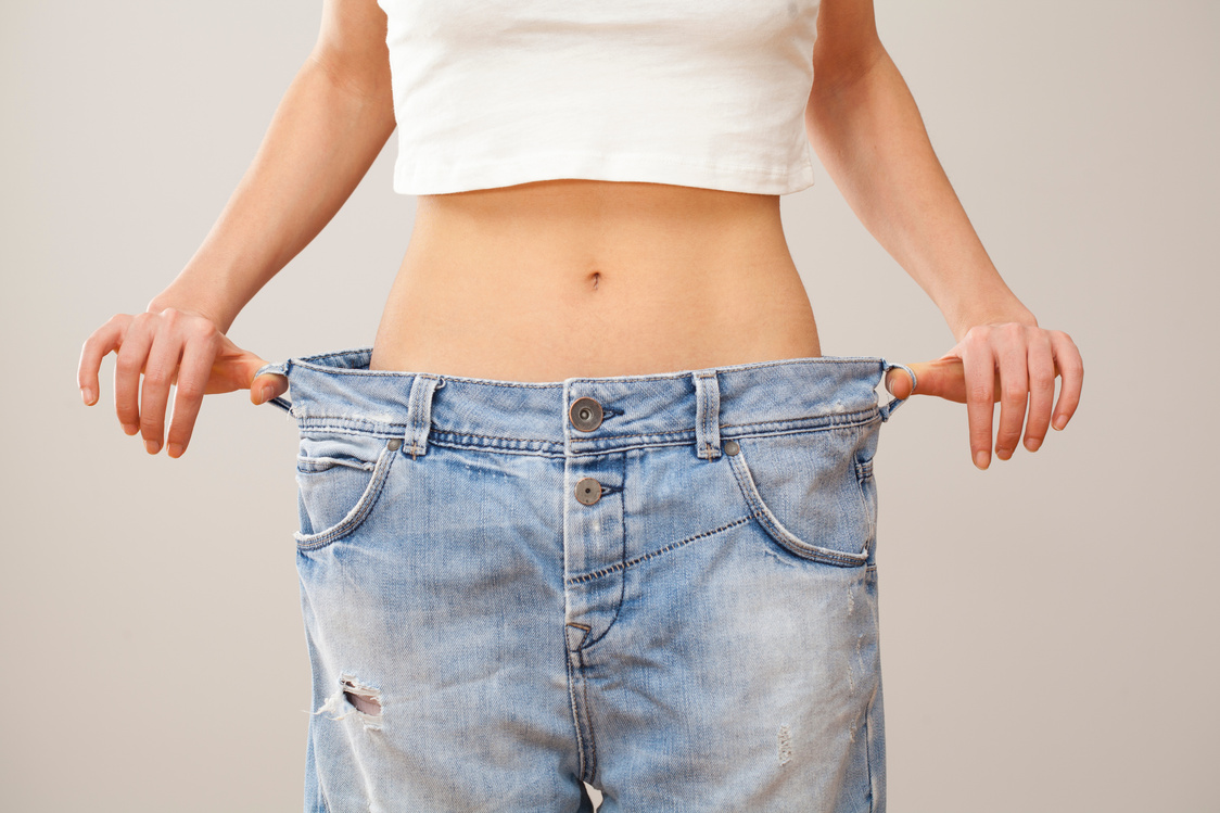 Weight loss woman with bluejeans
